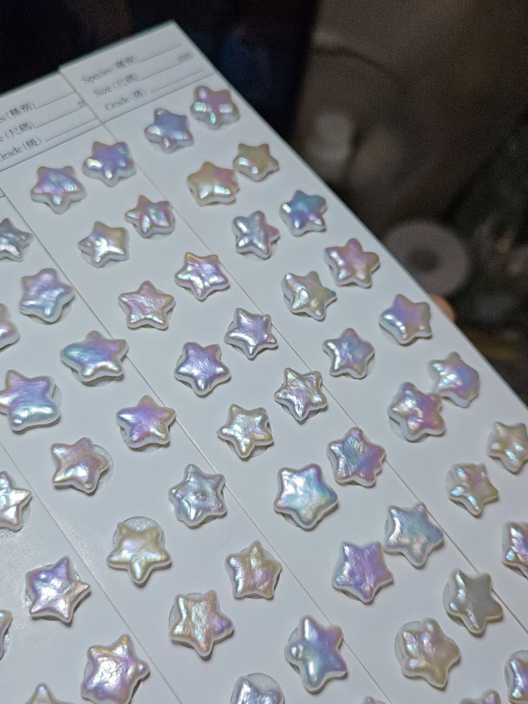 white star shaped pearl pairs with pink and blue hue naturally