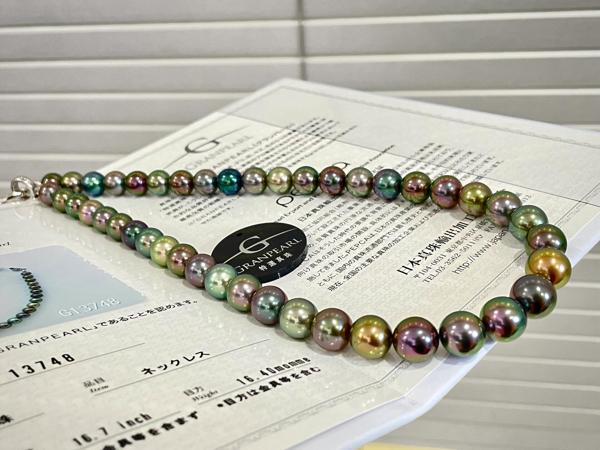 A luminous pearl necklace symbolizing purity wisdom self-acceptance and June birthstone energy