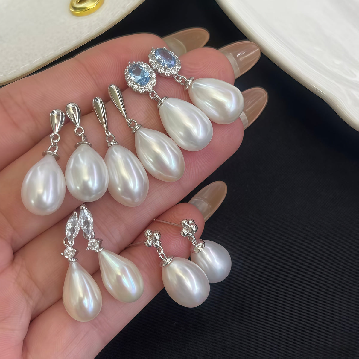 Pearl bridal earrings guide showing pearl studs, pearl drop earrings, pearl dangle earrings, pearl hoops, and pearl and diamond earrings for wedding looks