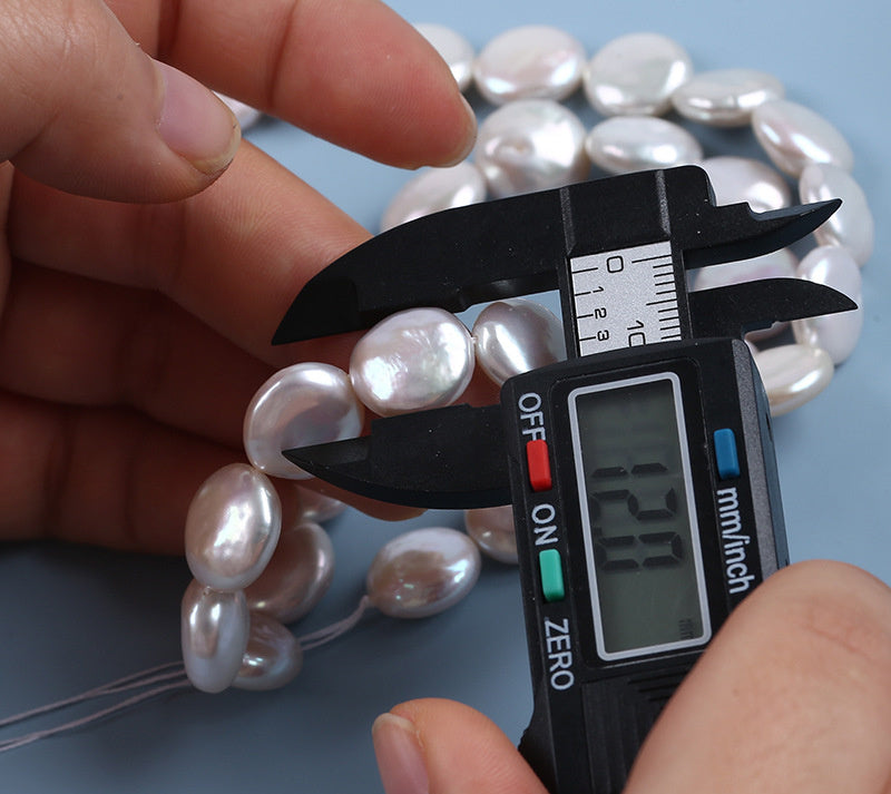 White Button Pearl Strand 11-12mm