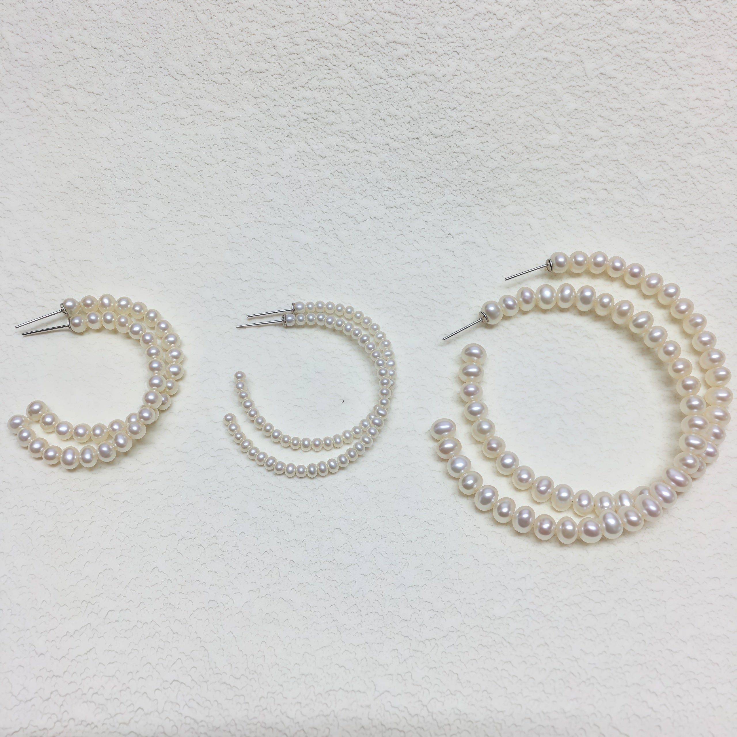 Freshwater pearl hoop earrings size comparison with 50mm and 30mm hoops in different rice pearl sizes